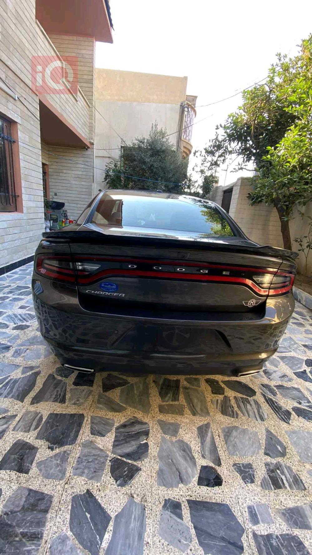دۆج چارجەر